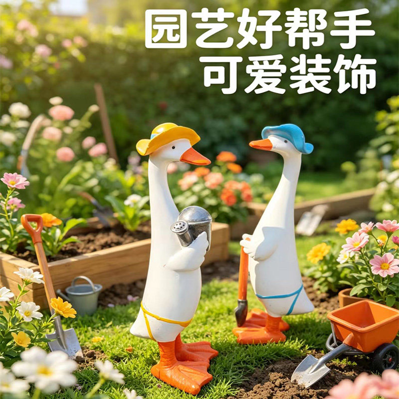 新款户外花园庭院卡通劳动情侣鸭图片
