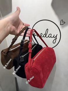 包包女2025新款秋冬真皮单肩斜挎手提圆筒包麂皮羊京绒通勤小拎包