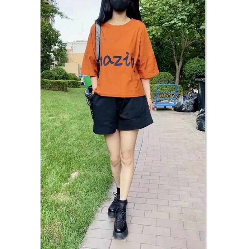 22555大爱美依缘2025夏季新款橘色字母宽松T恤黑色阔腿短裤女时尚