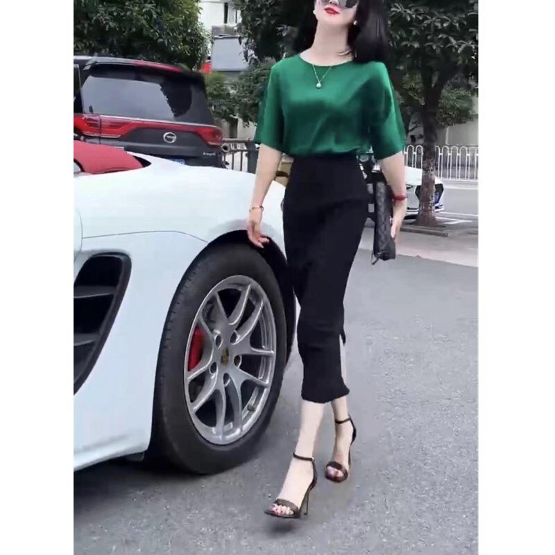23393大爱美依缘2025夏季新款绿色净版打底衫高腰半身后开叉裙女