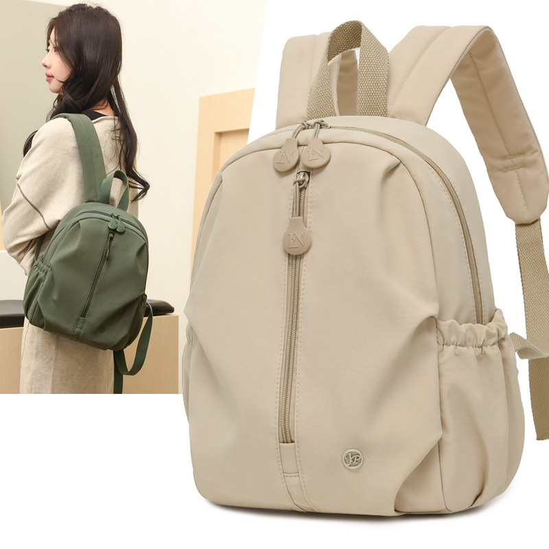 学生书包简约大容量百搭男女双肩包休闲旅行包通勤轻便背包登山包