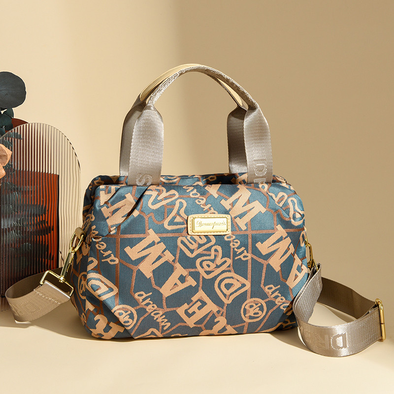 高级感牛津布手提波士顿包包女2026新款中年妈妈包百搭单肩斜挎包