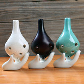 长嘴陶瓷裂纹6孔陶笛民族乐器 六孔熏烧教学陶笛送教材厂家