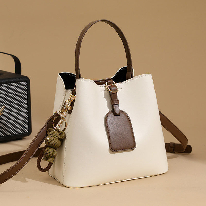水桶包包女2025新款2025新款手提女包高级感撞色通勤单肩包,箱包皮具/热销女包/男包,水桶包,淘宝优惠券,粉丝福利购,淘宝优惠卷