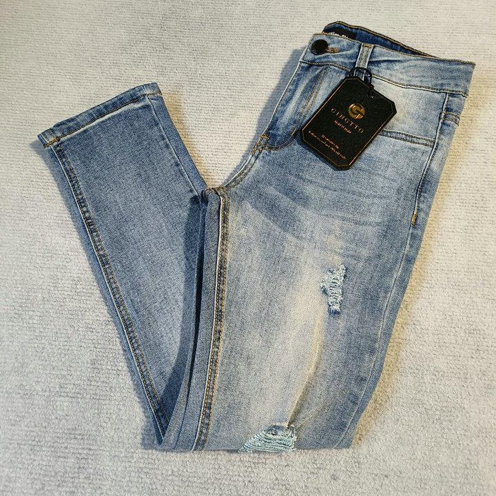男修身磨破潮款牛仔裤