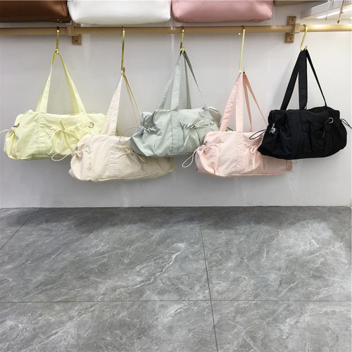 小脏柜 韩国小众ins新款蝴蝶结尼龙布包包运动休闲手提单肩托特包