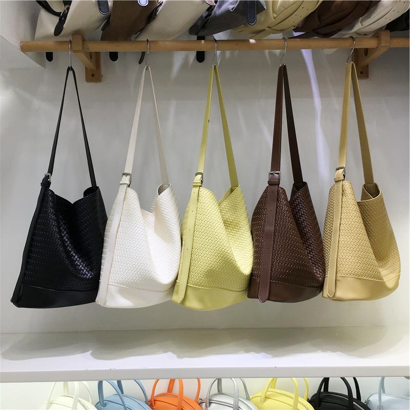 小脏柜 小众时尚大容量编织水桶包2026新款慵懒风单肩斜挎子母包