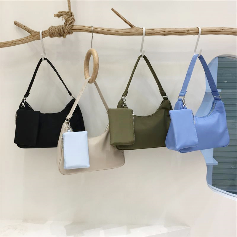 小脏柜 2025新款小众休闲简约百搭通勤尼龙布包包手提腋下法棍包