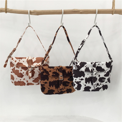 小脏柜 韩国东大门早秋新品奶牛纹毛毛手提小方包复古单肩腋下包