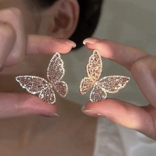 韩国东大门欧美夸张满钻蝴蝶结s925银针耳钉流苏耳环新款网红耳坠