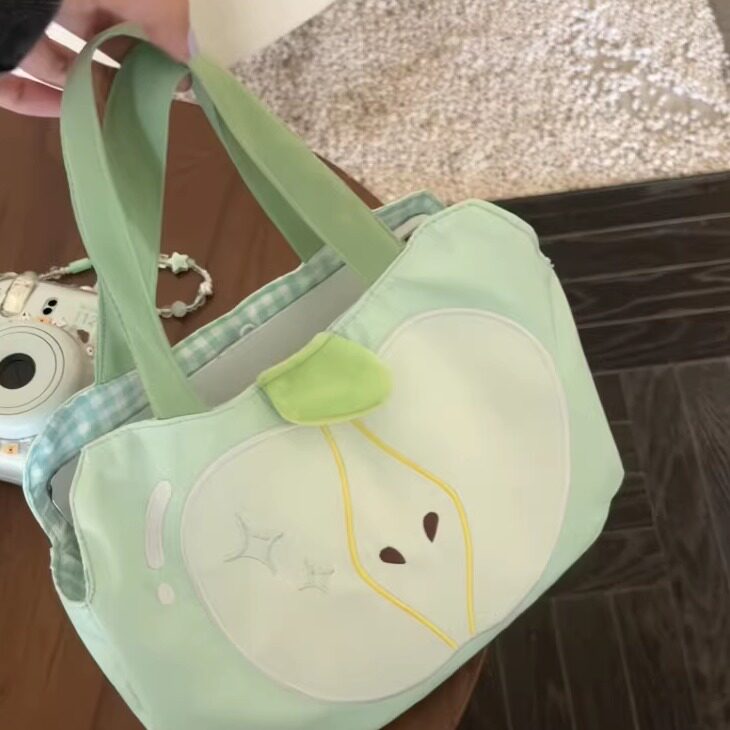 卡通青苹果手提单肩包女大容量通勤百搭帆布包2026春季新款手拎包