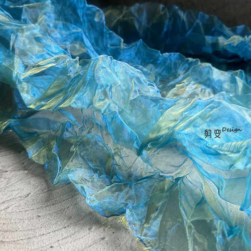 水晶肌理镭射欧根纱裙子服装布料