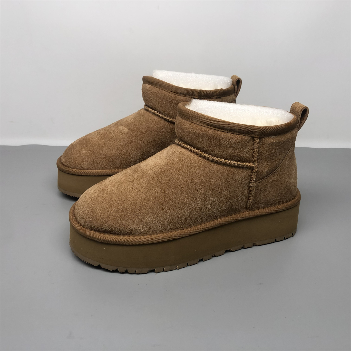 品牌撤柜真皮羊毛厚底雪地靴