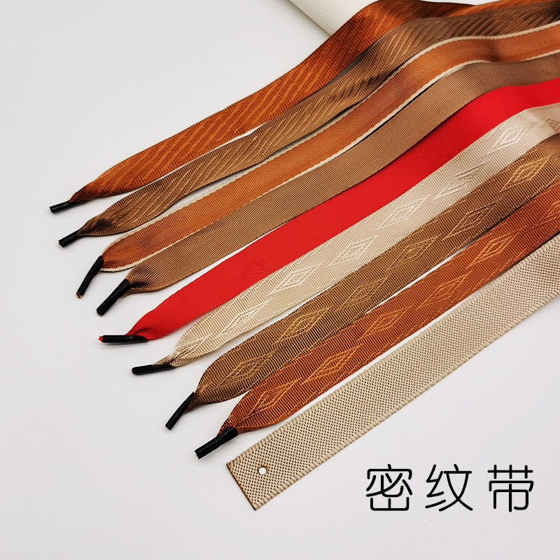 仿尼龙手提绳子密纹宽带手提带背包带扁宽编织打孔铆钉铁头织带