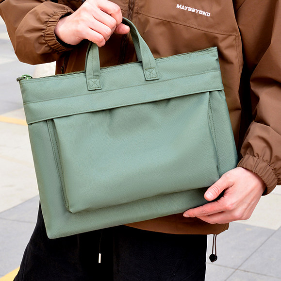 新款飞行员包新式头盔单肩斜挎包军绿色空勤航展战术手提包携行包