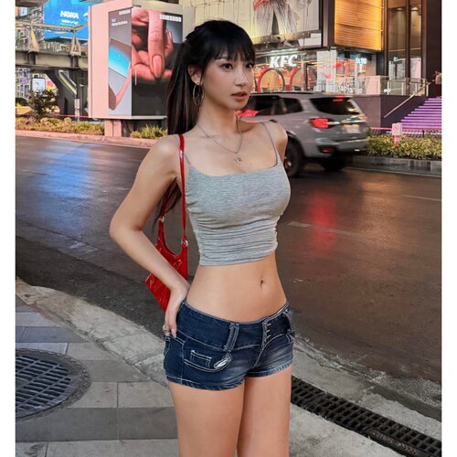 美式复古蓝色排扣低腰牛仔超短裤女2026夏季新款辣妹修身包臀热裤