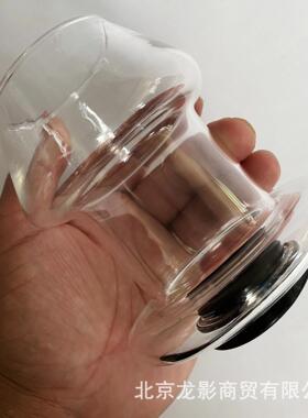 A self-pleasuring toy made of glass for use inside the anus.