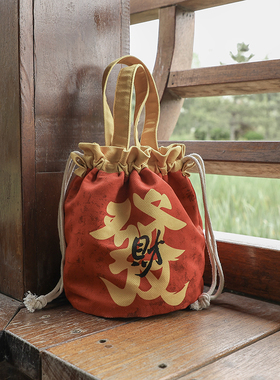 帆布印花单肩包女新款红色锦囊手提水桶包时尚百搭斜挎发财钱袋子