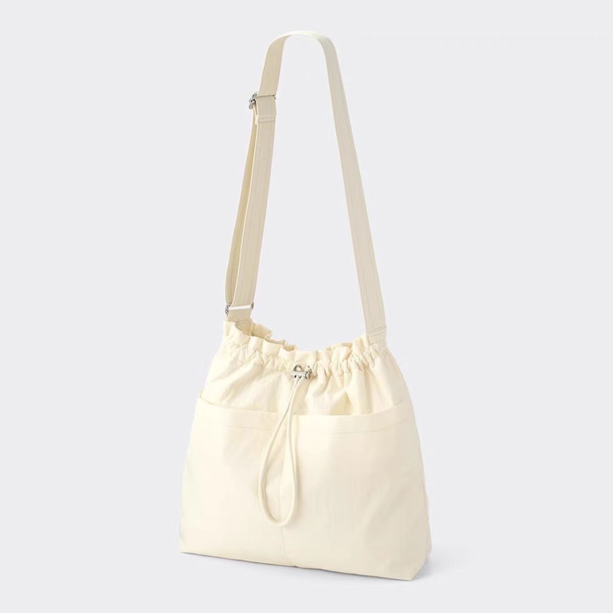 日系大容量抽绳尼龙包单肩斜挎包上班通勤手提托特包女2024新款