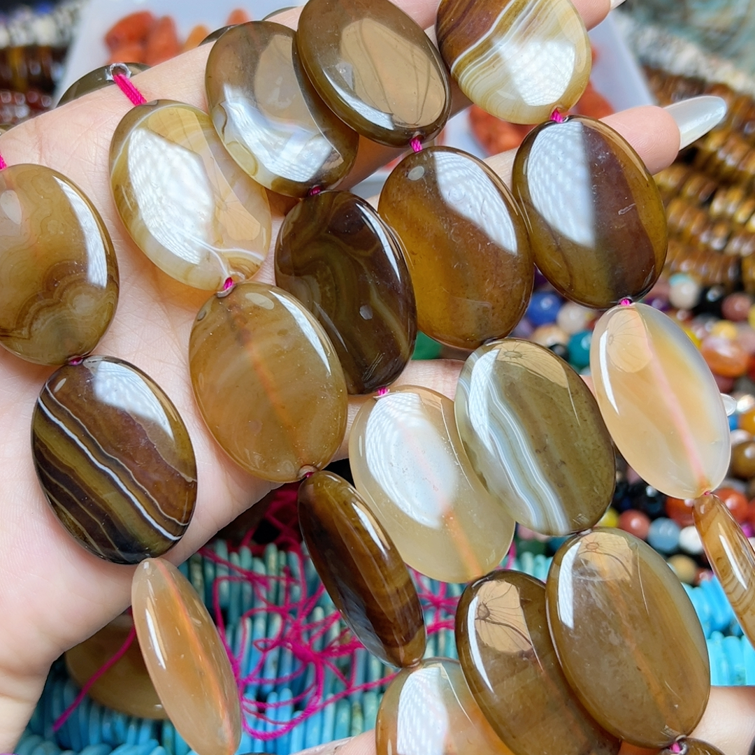 K567 25*34mm天然咖啡玛瑙椭圆一条