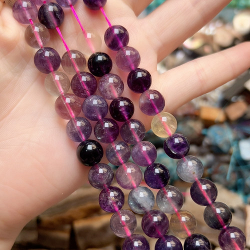 K159。9mm天然萤石圆珠一条