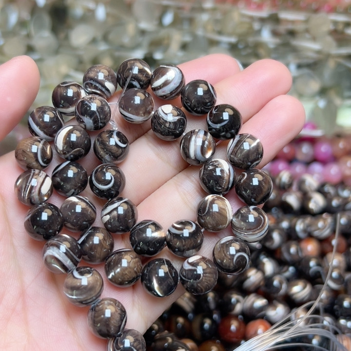 M642新款。黑金贝圆珠10mm一条