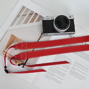 适用佳能R50富士XT30三代索尼zve10二代尼康Z50背带皮质单肩斜挎