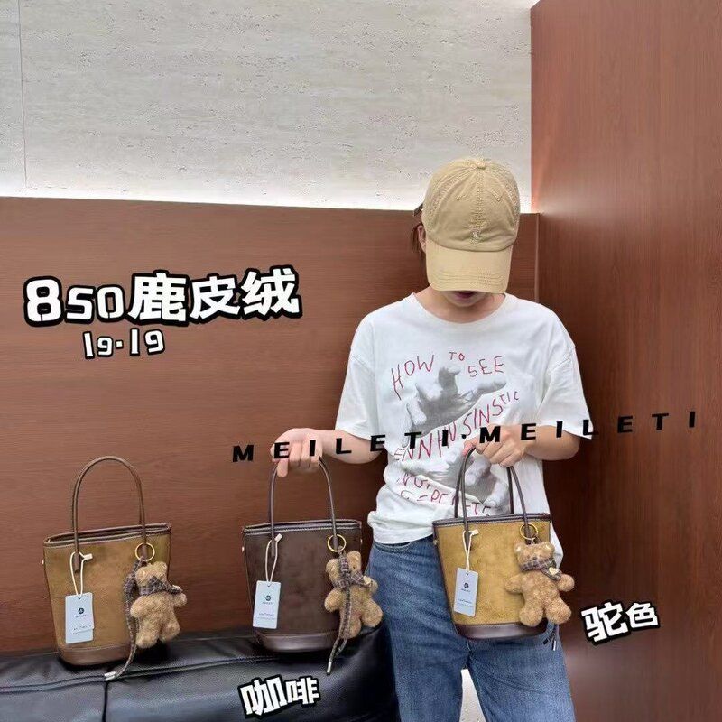包包女2026新款单肩斜挎包时尚质感腋下包个性洋气绒面秋冬水桶包
