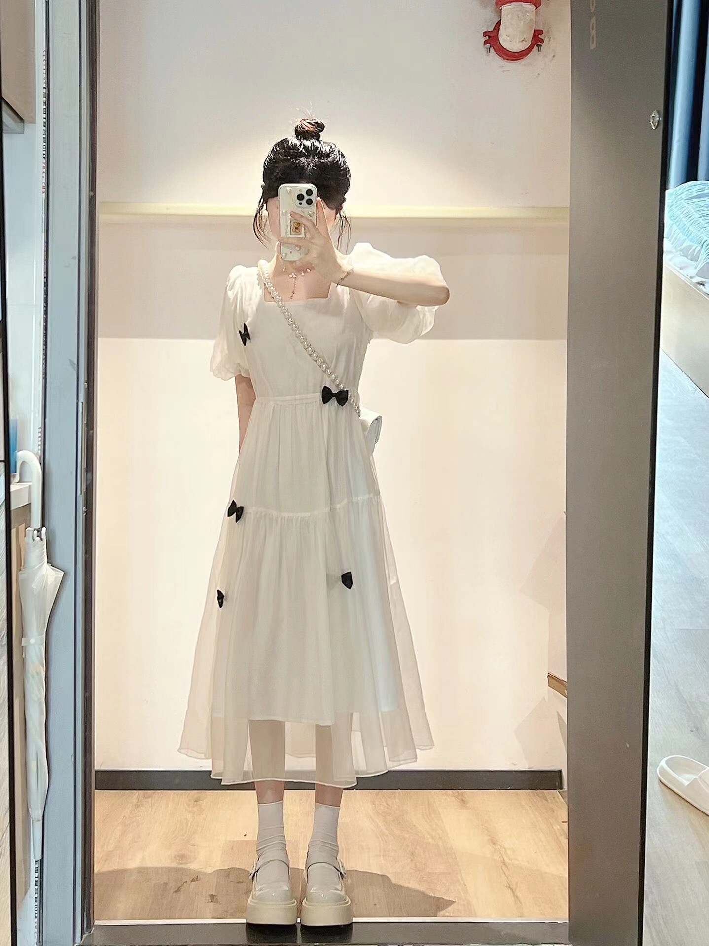 杏色方领泡泡袖连衣裙女夏设计感小众蝴蝶结茶歇收腰长裙网纱裙子