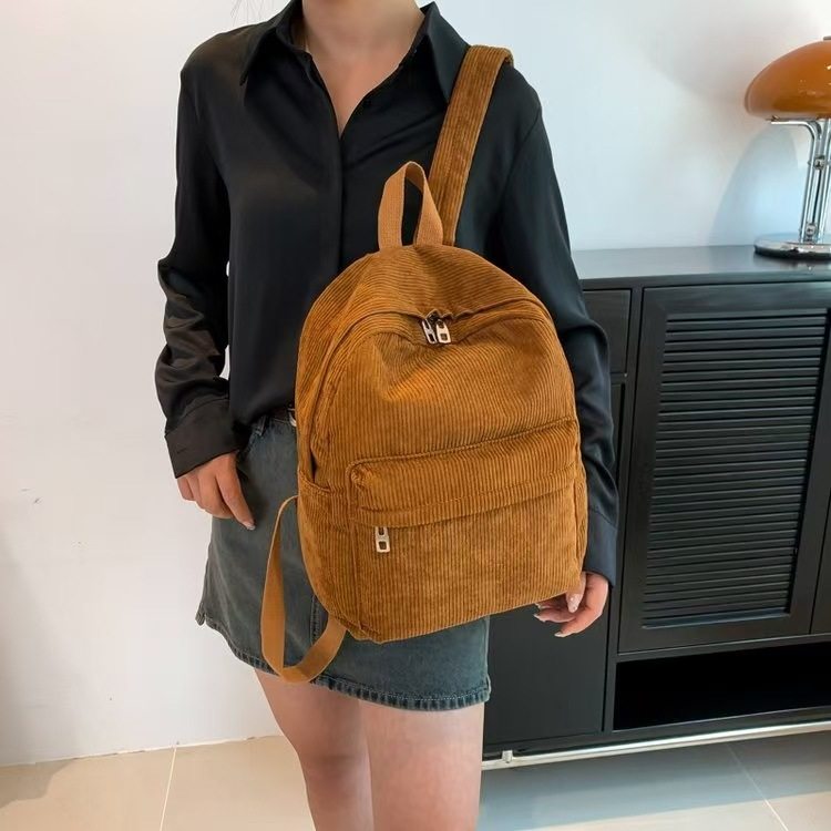 时尚女士灯芯绒双肩背包休闲流行款简约纯色大容量大学学生书包