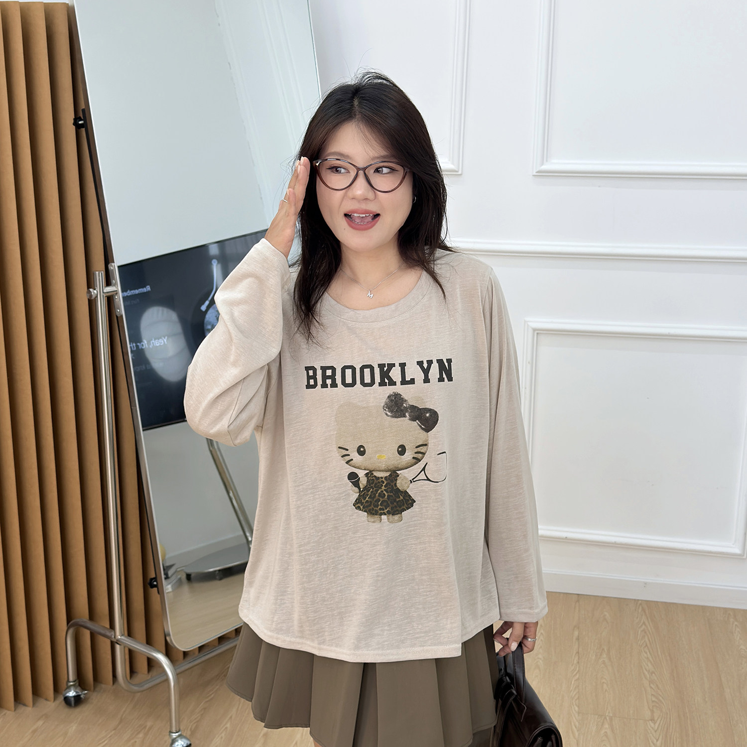 宛宛大码胖mm女春秋新款宽松休闲上衣设计感小众遮肉卡通长袖t恤图片