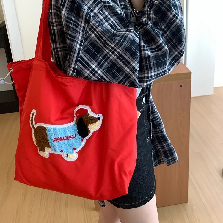 ins腊肠小狗红色帆布包女2025新款夏季大容量单肩包慵懒风托特包
