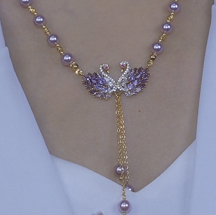 紫色珍珠双天鹅项链女2025新款轻奢小众设计高级感古风毛衣链配饰