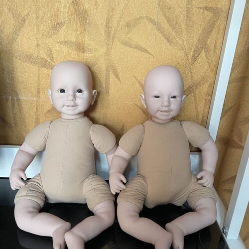 22寸新款六颗牙仿真重生娃娃裸娃四颗牙眯眯眼笑脸衣服可自由搭配