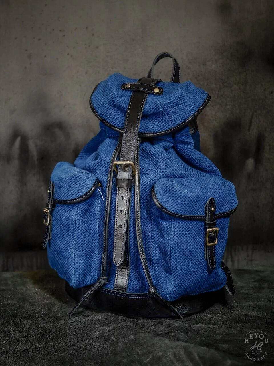 HEYOU刺子布皮革拼接双肩后背包