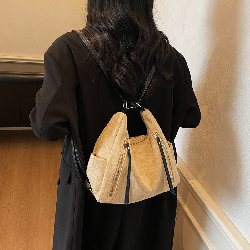 红鹮鸟韩系慵懒大容量通勤双肩包