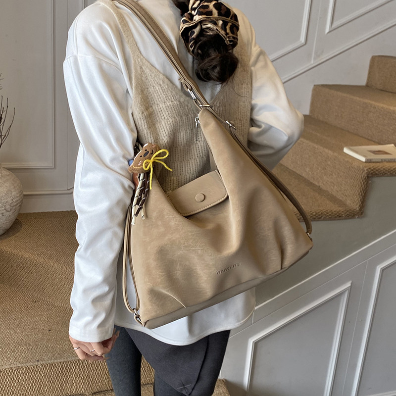 红鹮鸟2026秋冬韩系双肩包百搭日常单肩软PU可爱通勤斜挎包