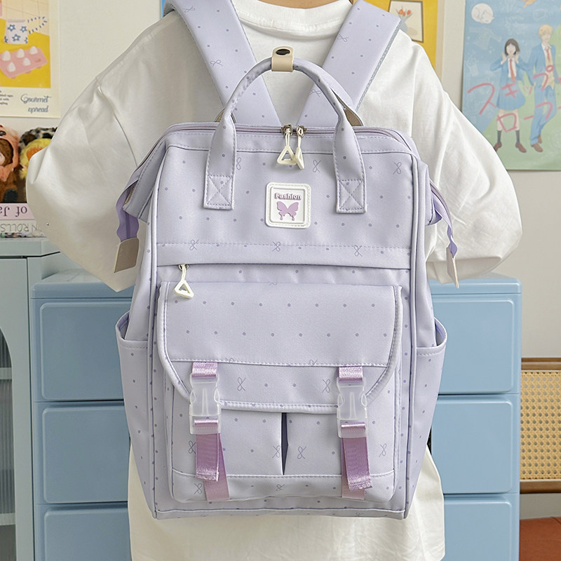 红鹮鸟双肩包女通勤书包学院风大学生大容量电脑旅行轻便背包男