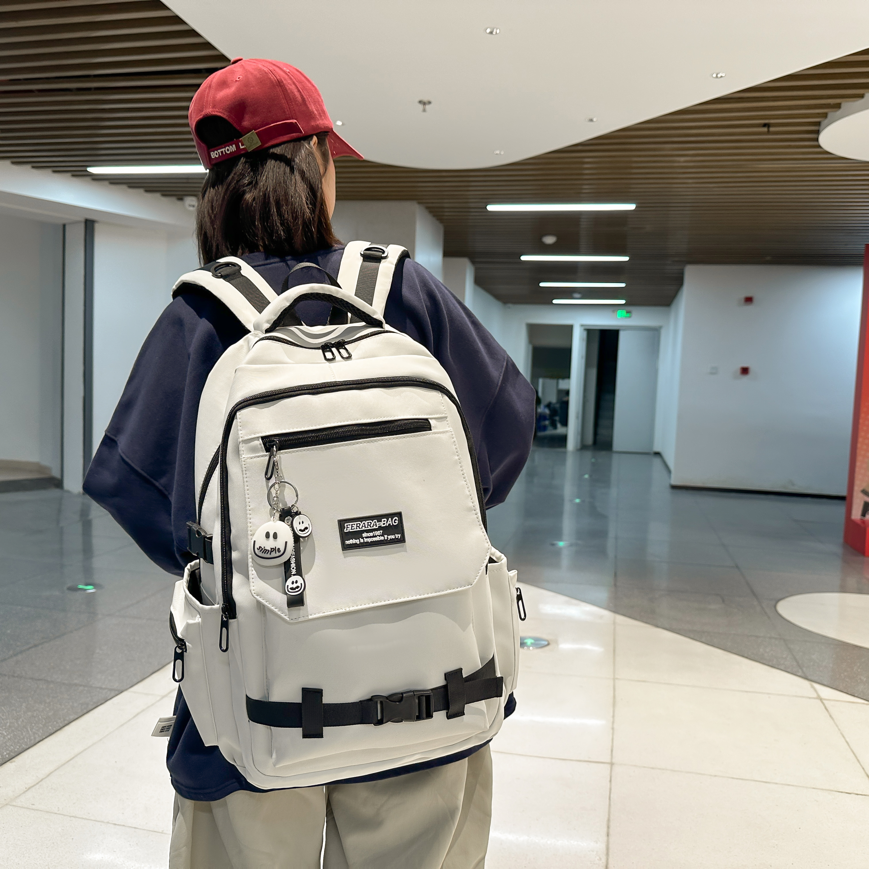 红鹮鸟大容量初中生书包大学生双肩包男女小学生涂鸦电脑旅行背包