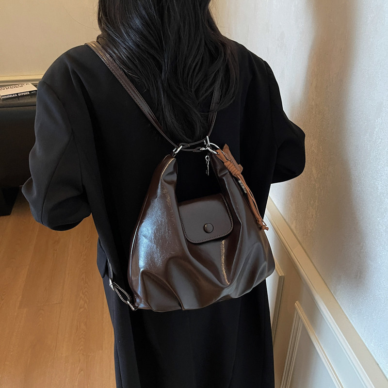 红鹮鸟高级感复古大容量包包女2025通勤双肩软PU单肩托特包