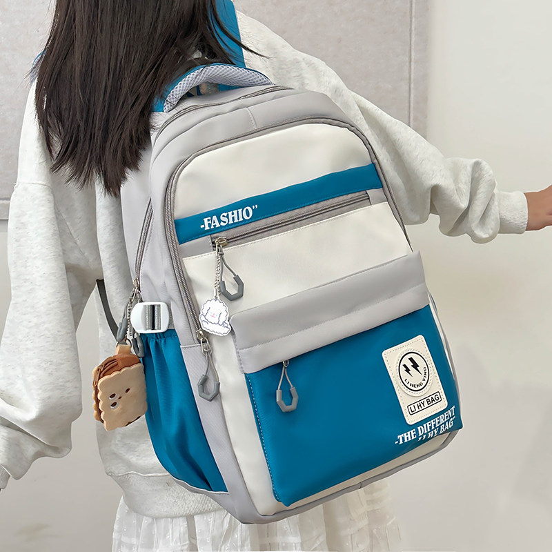 美式双肩包初中女生高颜值中学生书包潮流高中生大容量减重背包男