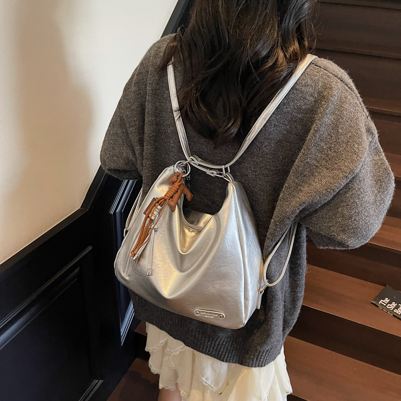 红鹮鸟托特包女大容量2025休闲小众设计单肩软PU多功能双肩