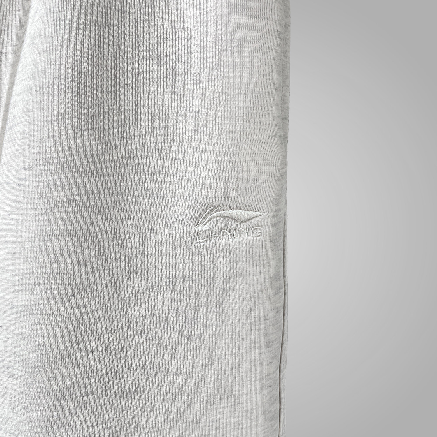 李宁长裤2025春季新款日进斗金系列男子圣诞束脚宽松卫裤AKLV097