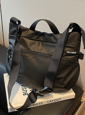 休闲包包女式2025新款流行黑色手拎包轻便布包单肩包大容量斜挎包