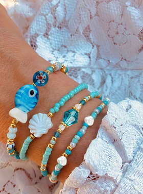 原创设计蓝色琉璃水晶童趣夏日小众手链奇趣贝壳扇贝珍珠白手链女
