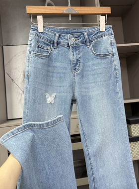 让人爱不释手的魔法裤！修身烫钻蝴蝶牛仔喇叭裤女   KW55079~ZY