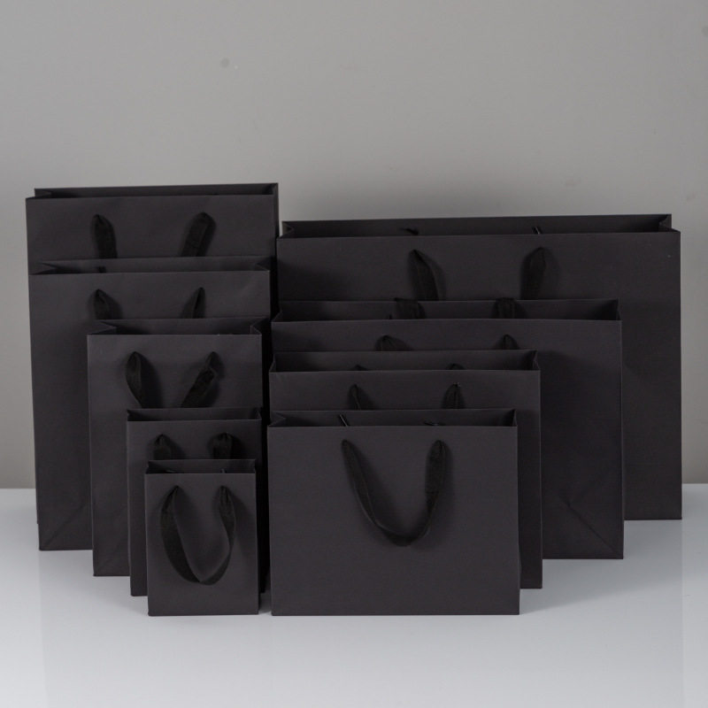 现货黑色礼品袋纸袋包装服装黑卡印LOGO手提袋厂家20个价