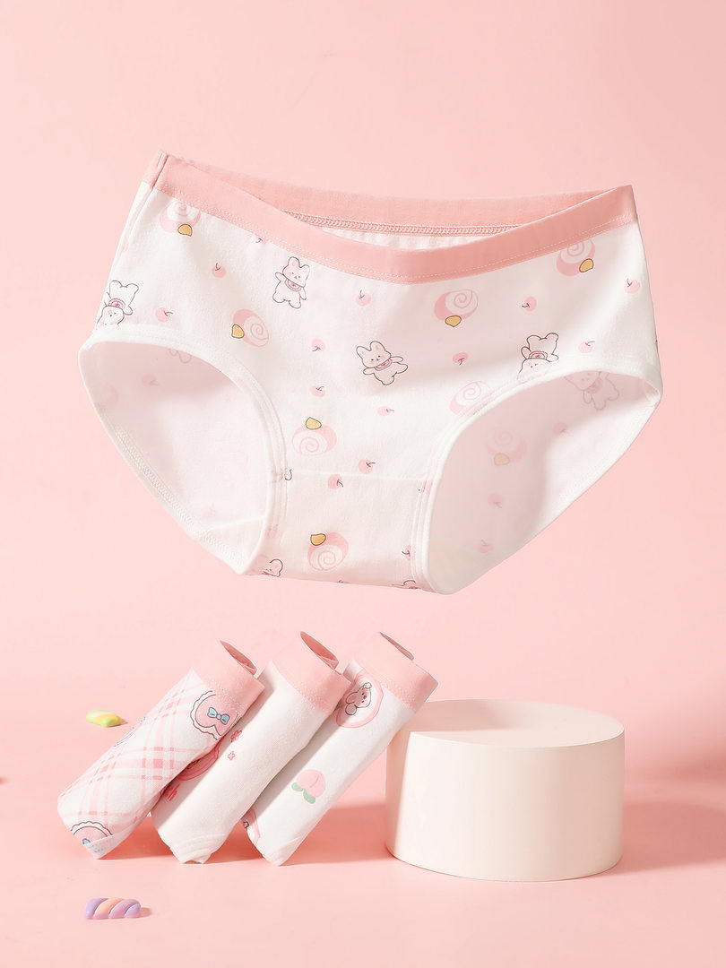 Pastel printed women's underwear briefs on pink background