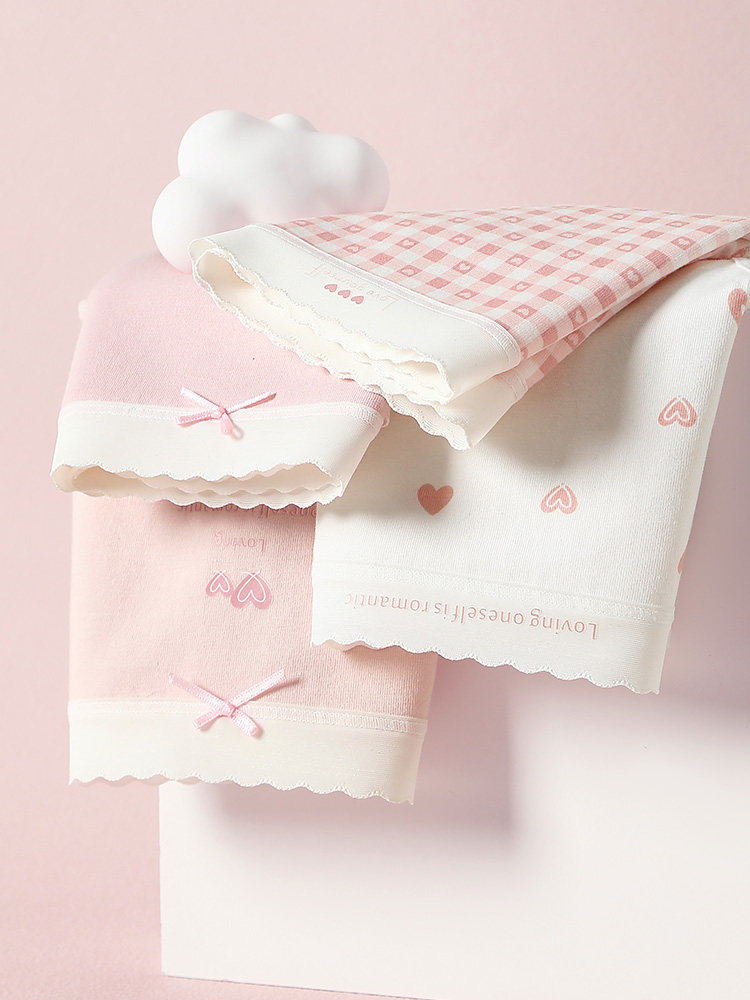 Pastel pink and white patterned underwear or shorts with heart details