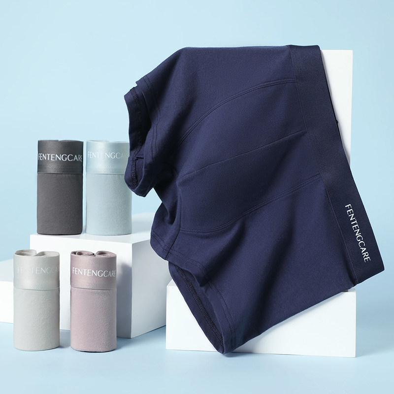Folded navy athletic shorts or underwear displayed on boxes
